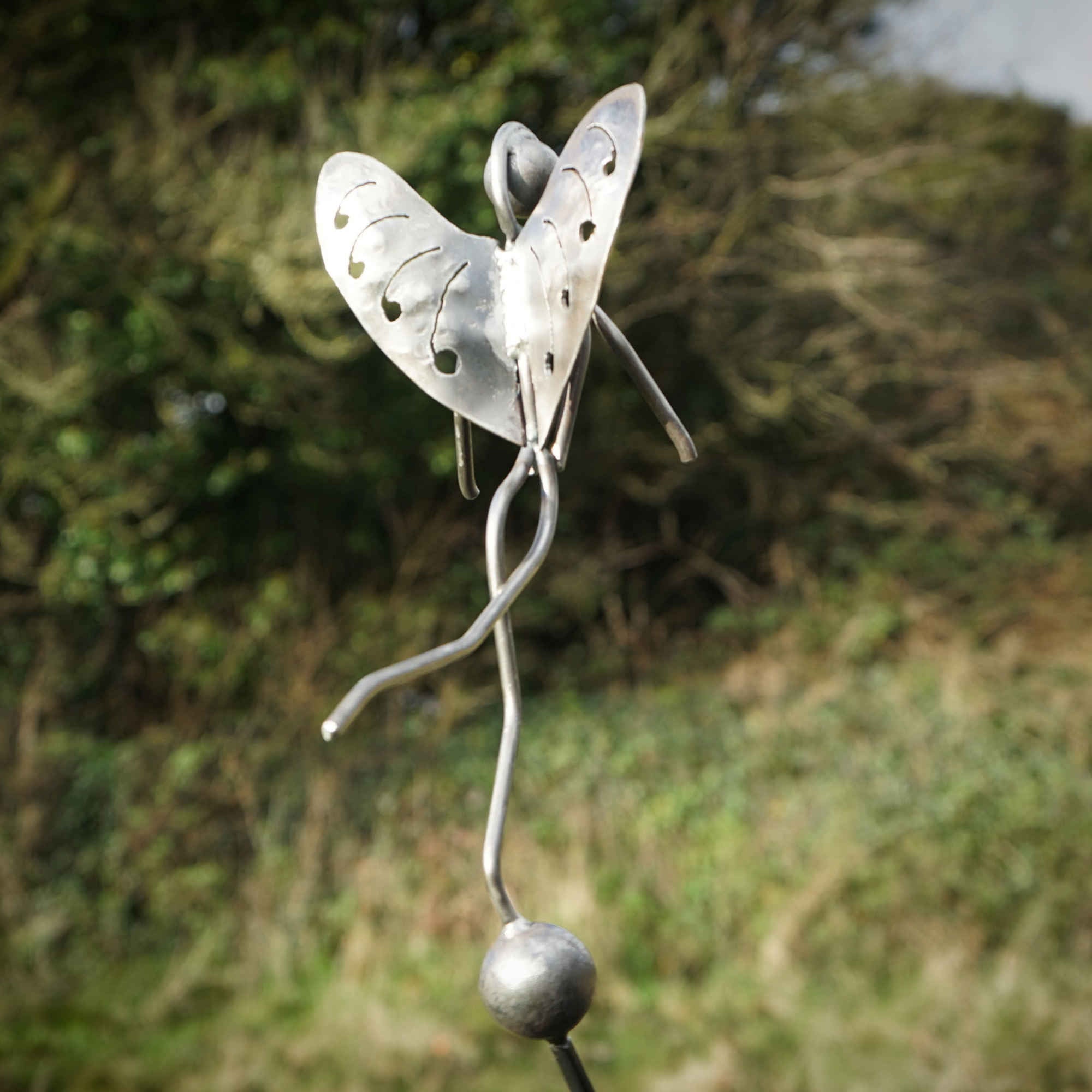 Stainless Steel Woodland Fairy on Rusty Metal Seed Head. Garden art sculpture image 0